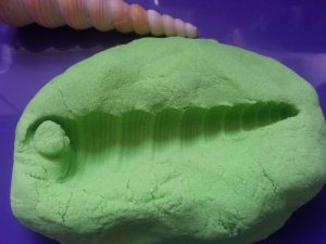 Assingment Three - Casting the internal space of a vessel - Kinetic sand and wax crayon