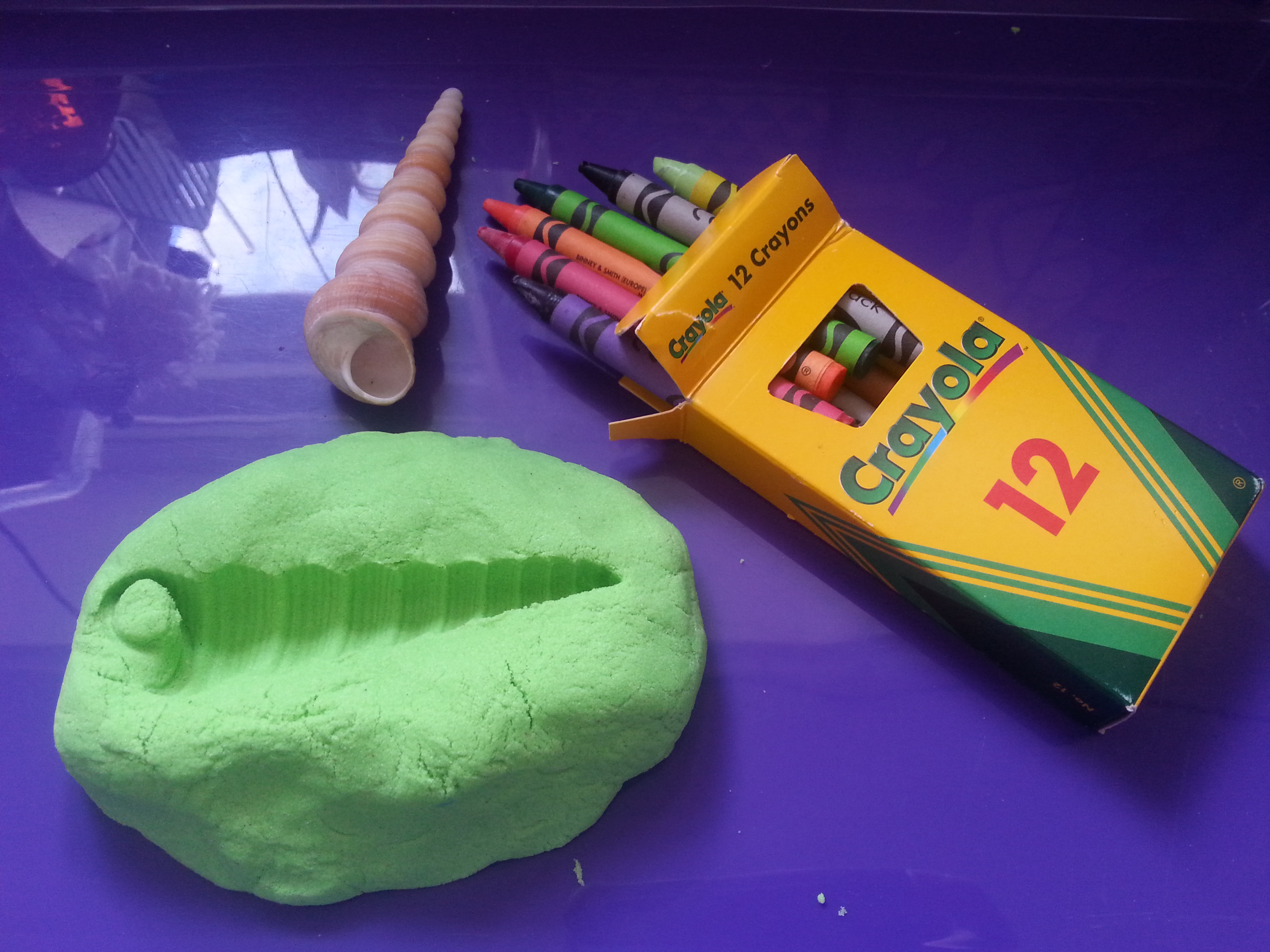 Assingment Three - Casting the internal space of a vessel - Kinetic sand and wax crayon